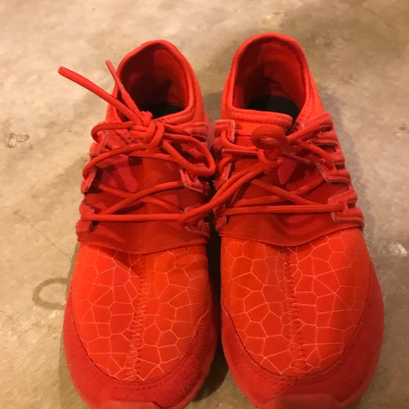 all red adidas tubular radial